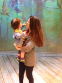 Mama Shana Cooper, Director, and son Jonah, 15 months, exploring the projections on stage during dinner break of rehearsal for The Nether, Wooly Mammoth Theatre Company.